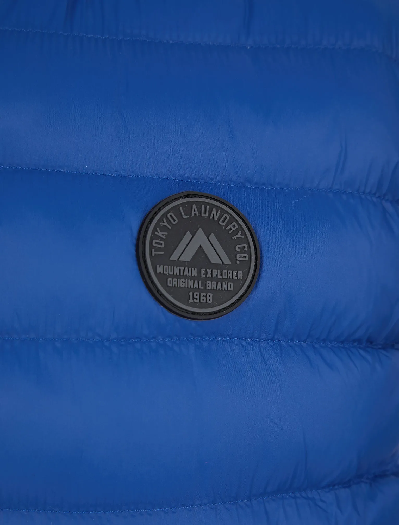 Cannes Quilted Puffer Gilet with Fleece Lined Collar in Sodalite Blue - Tokyo Laundry